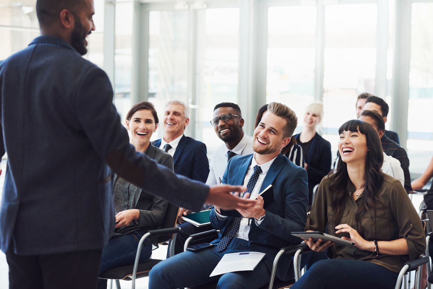 Group of Businesspeople Attending a Meeting